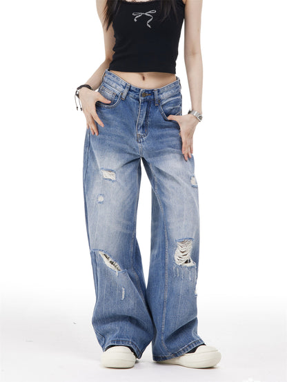 Women's Ripped Washed Blue Jeans